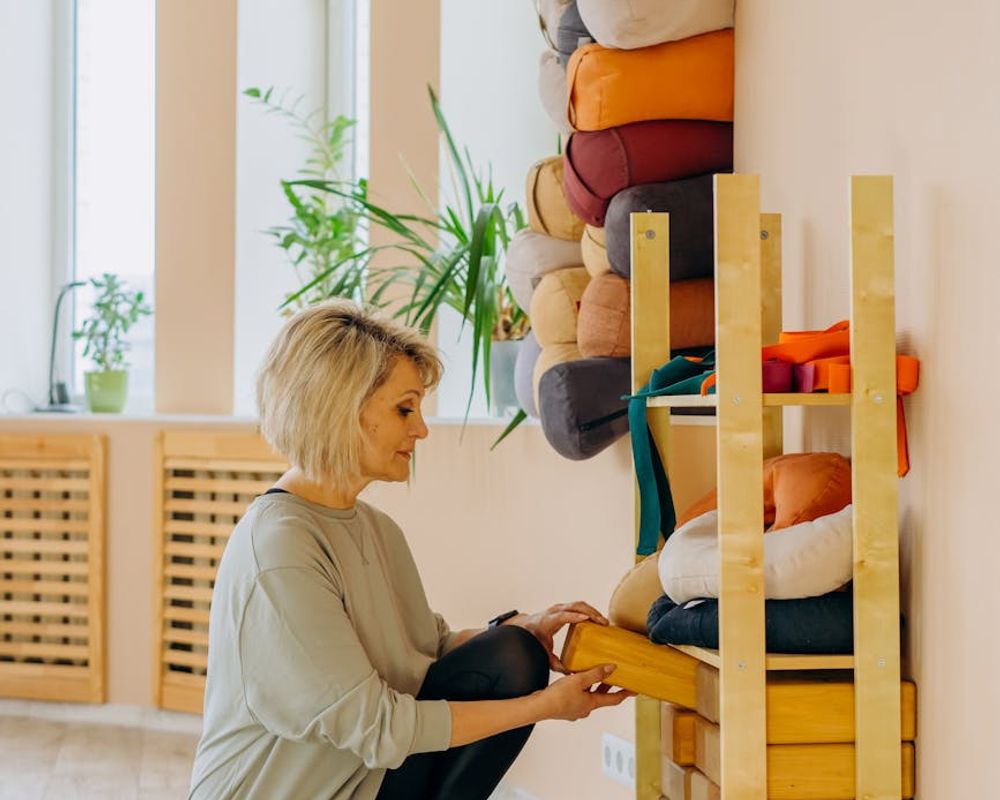 Minimalist yoga studio with warm natural lighting and plants